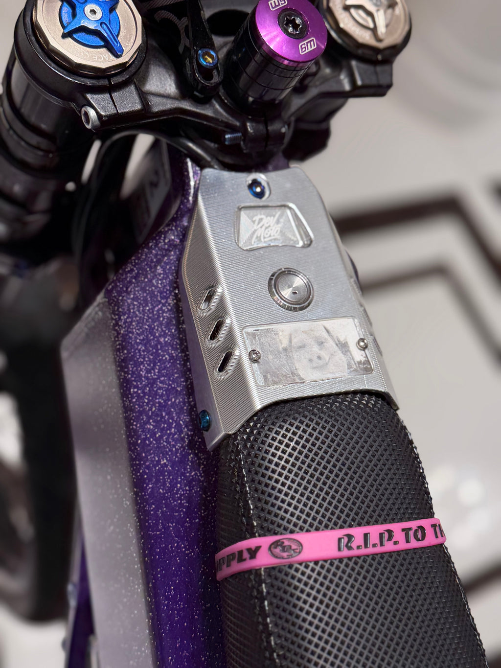Talaria X3 metal ignition cover installation view