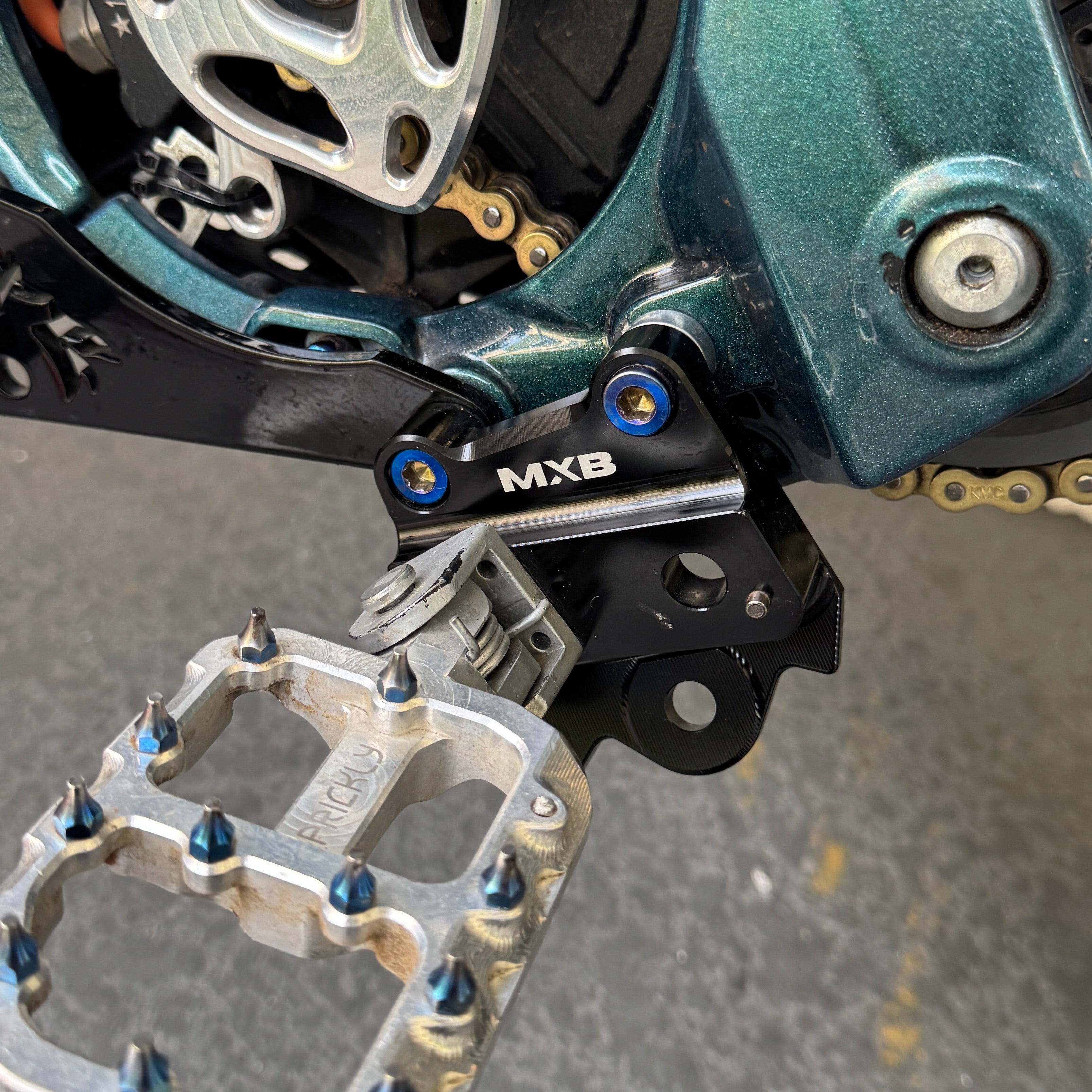 MXBolts CNC foot peg bracket for Talaria XXX