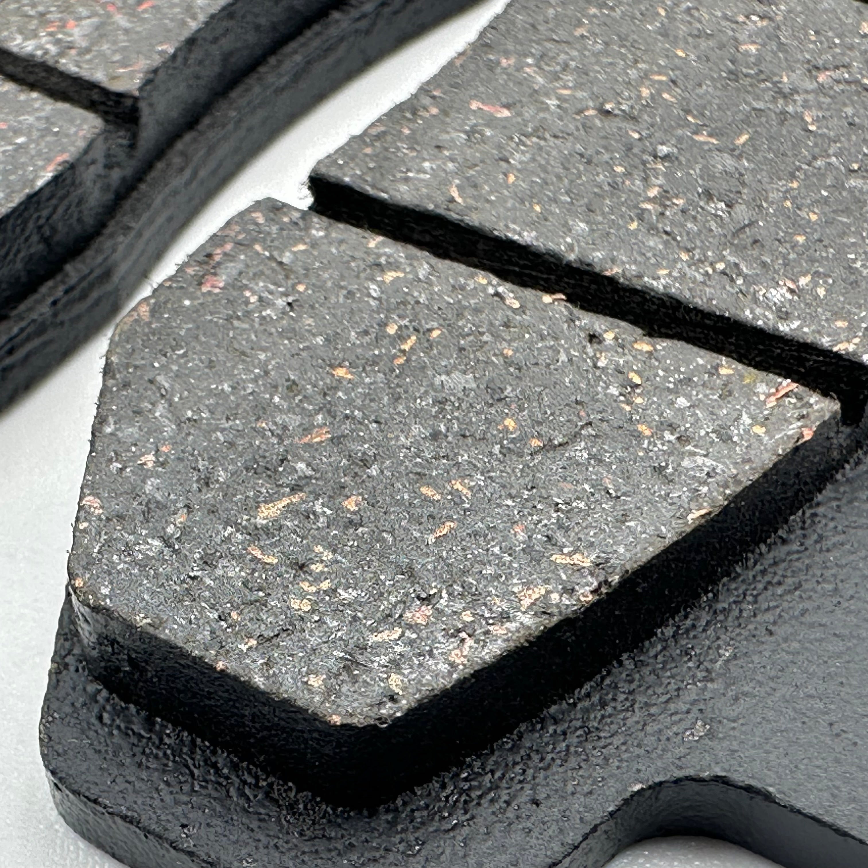 Close-up of Sur-Ron Ultra Bee replacement brake pads