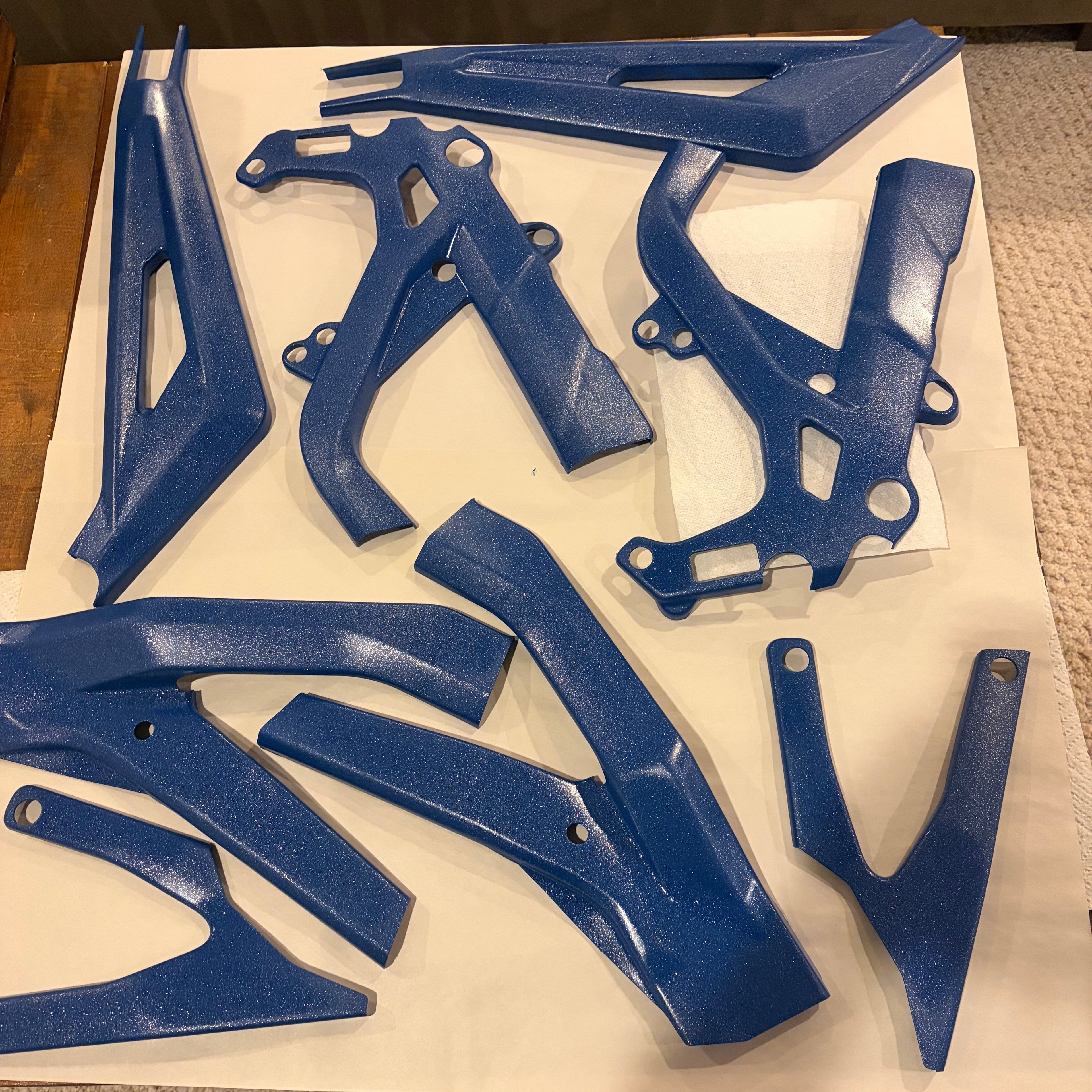 Custom painted Surron LBX frame guards